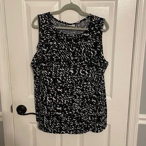 Sleeveless black and white blouse